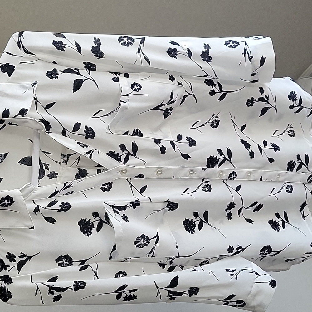 White blouse w/ black floral pattern
